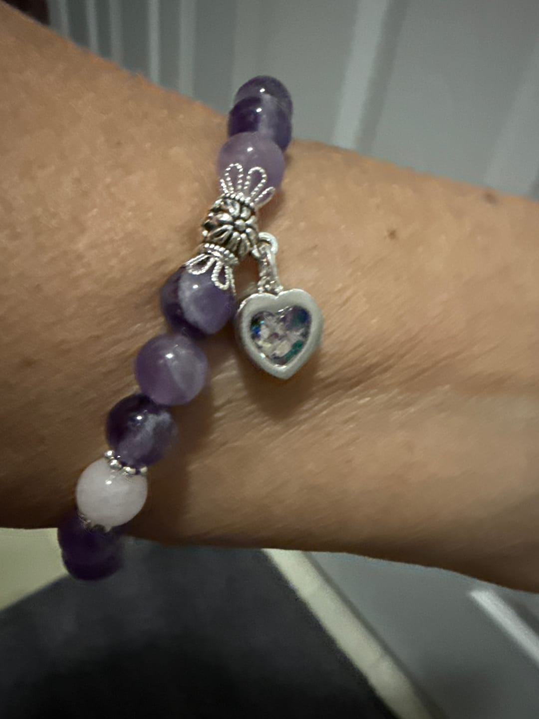 Customer photo review of Amethyst and Rose Quartz Healing Bracelet with Cremation Ashes