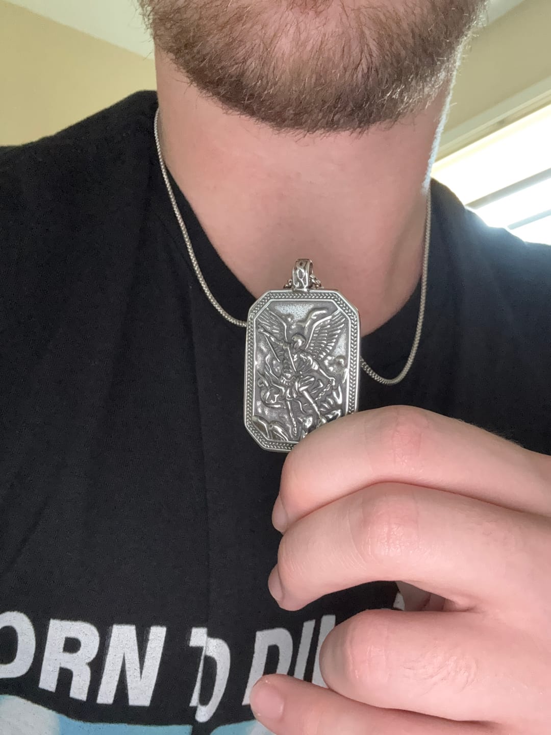 Customer photo review of FREE Today: Classic Style St. Michael the Archangel Protection Stainless Steel Pendant Necklace