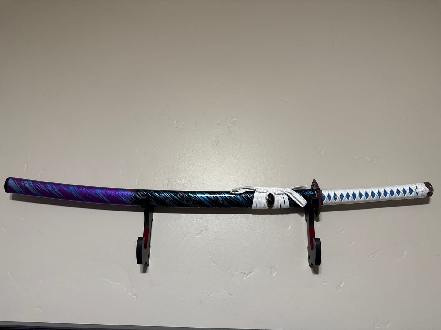 Customer photo review of The Giyuu Tomioka Handmade Katana Clay Tempered T10 Steel From Demon Slayer