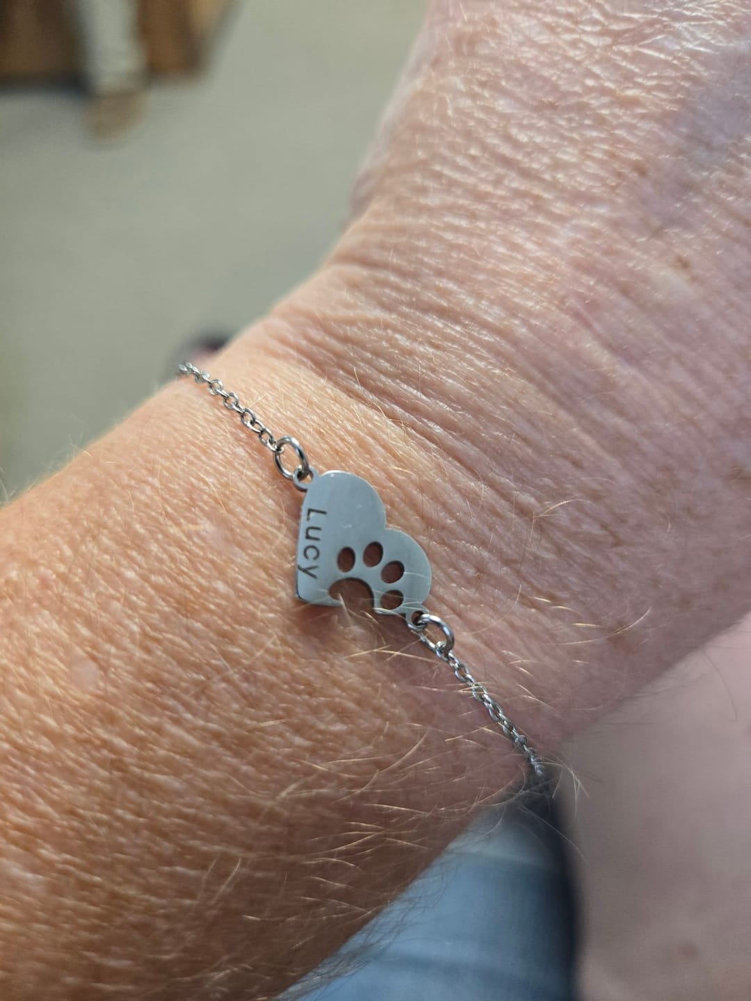 Customer photo review of Custom Paw & Heart Name Bracelet