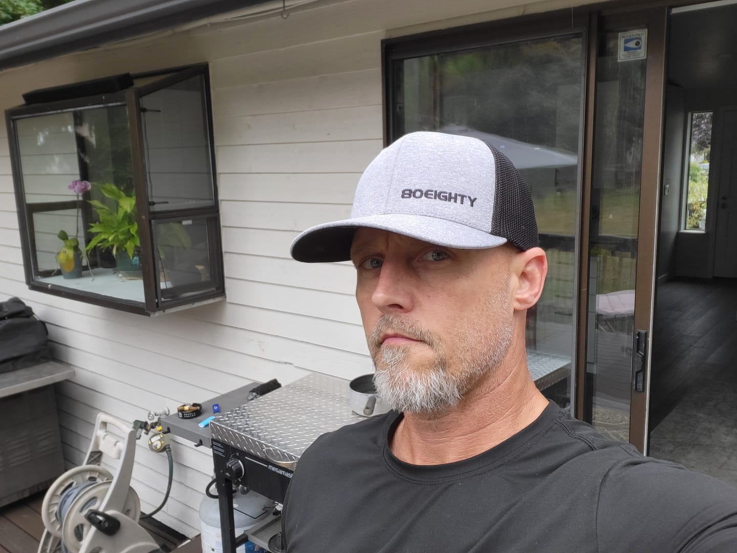 Customer photo review of 80Eighty® Melange Trucker Hat