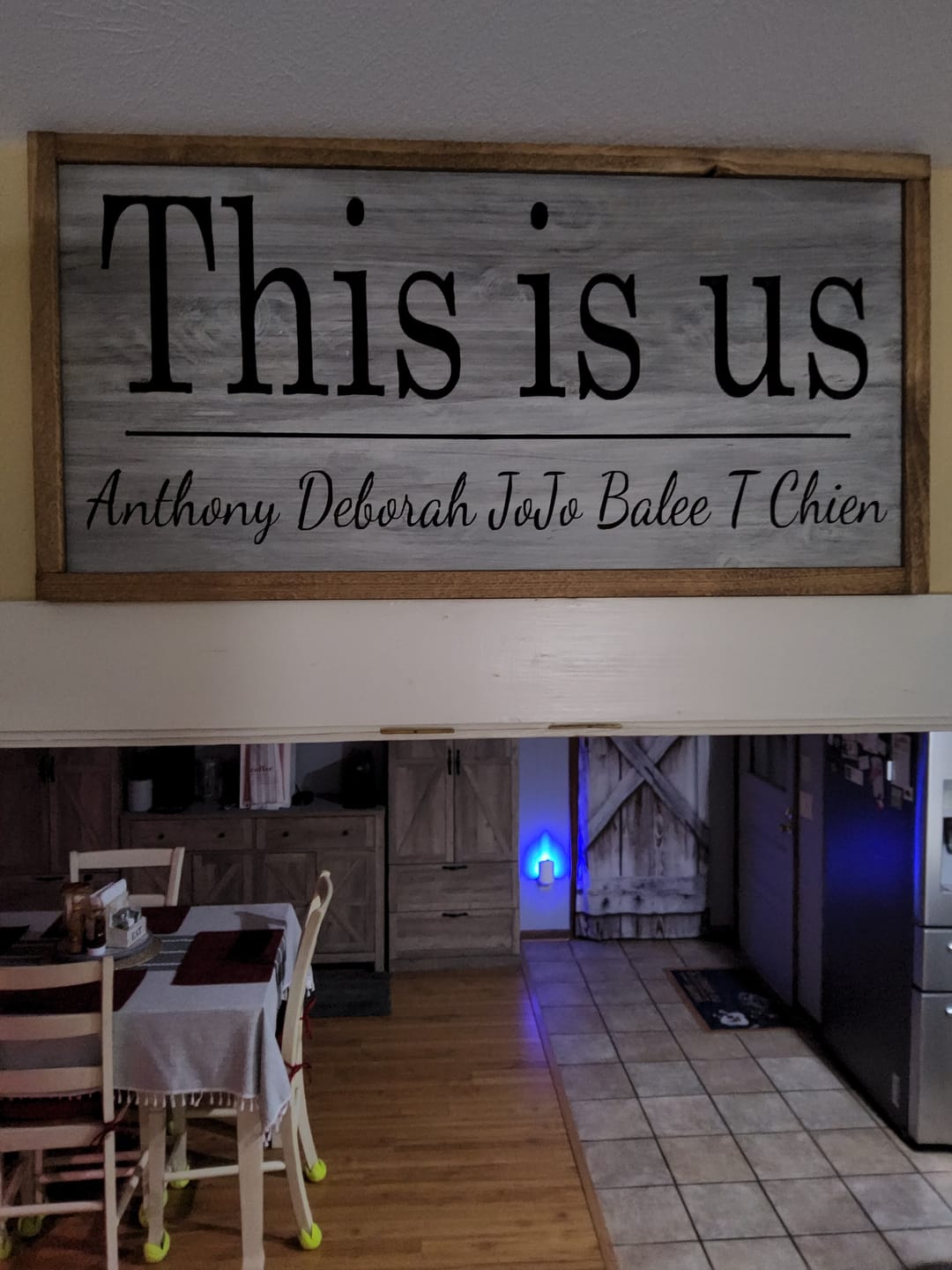 Customer photo review of Personalized "This is Us" Carved Wooden Sign - Custom with Names