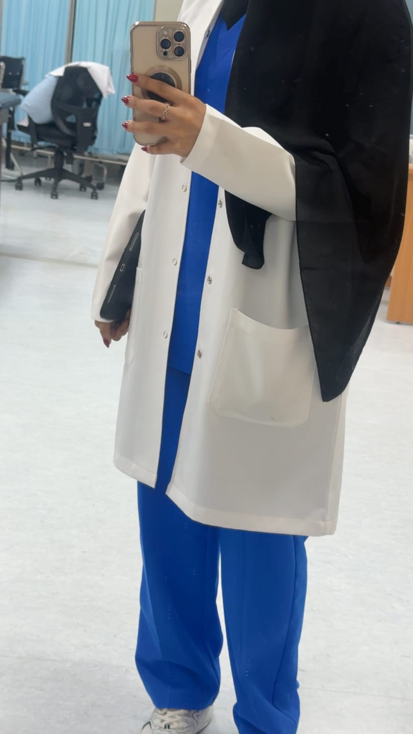 Customer photo review of S&C Pro Unisex Scrub Top S2102