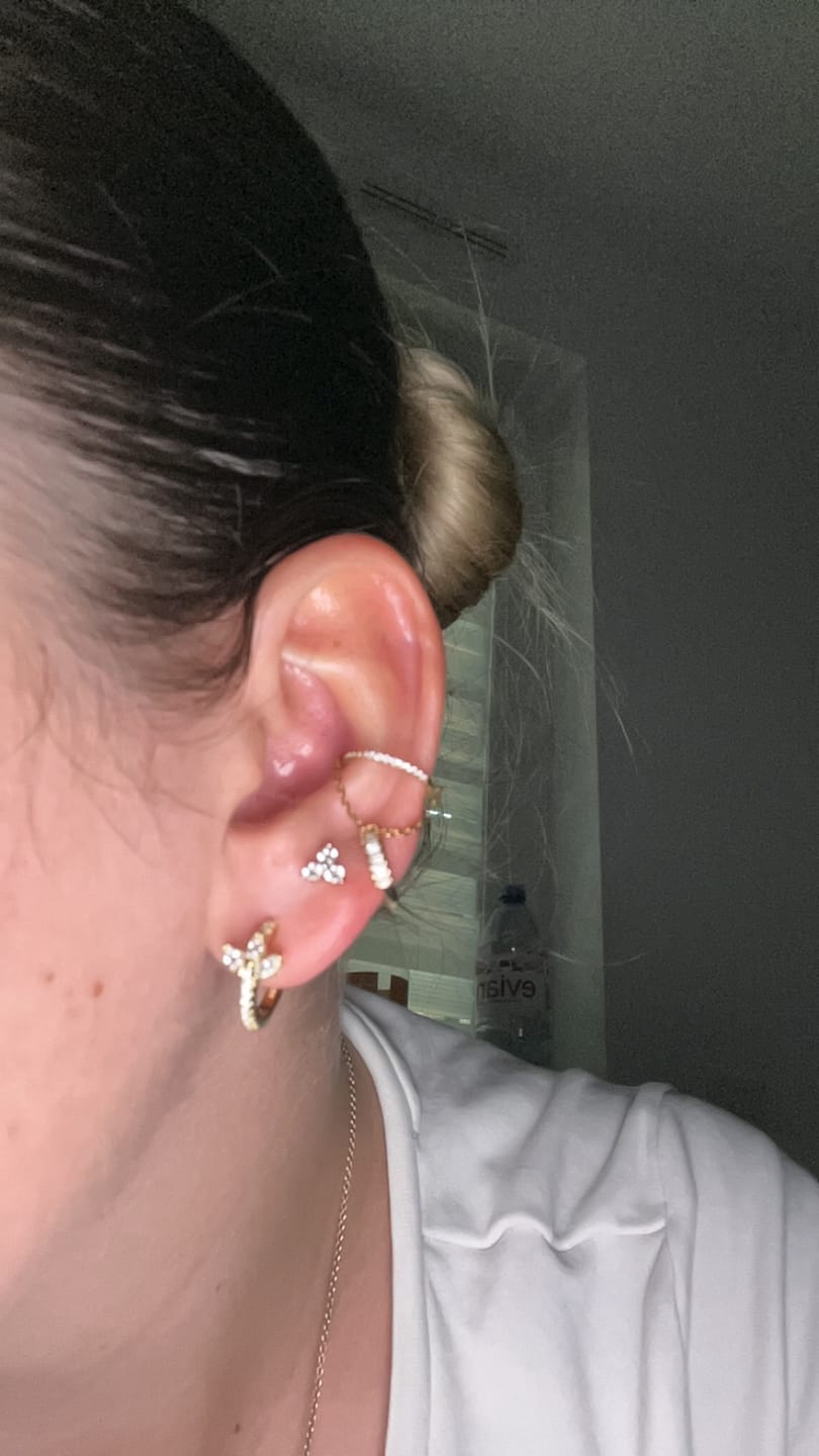 Customer photo review of Buena Piercing | Titan