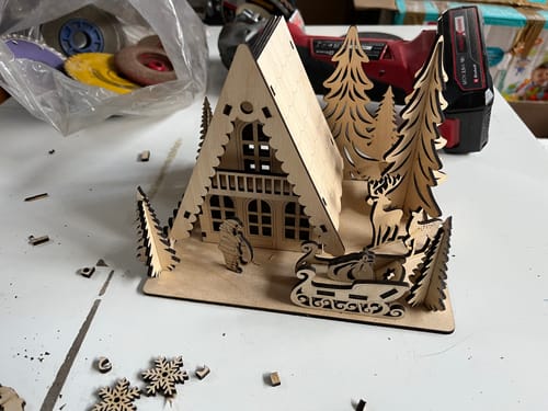 Customer photo review of Christmas house Santa sleigh scene laser cut svg file