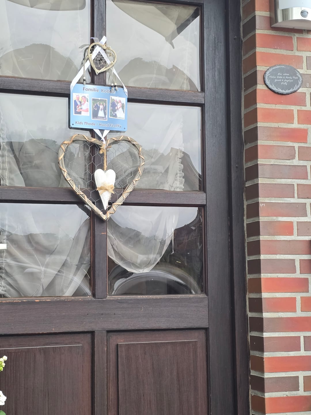 Customer photo review of Hunde-Türschild personalisiert mit Foto & Text (UV- und wetterfest)