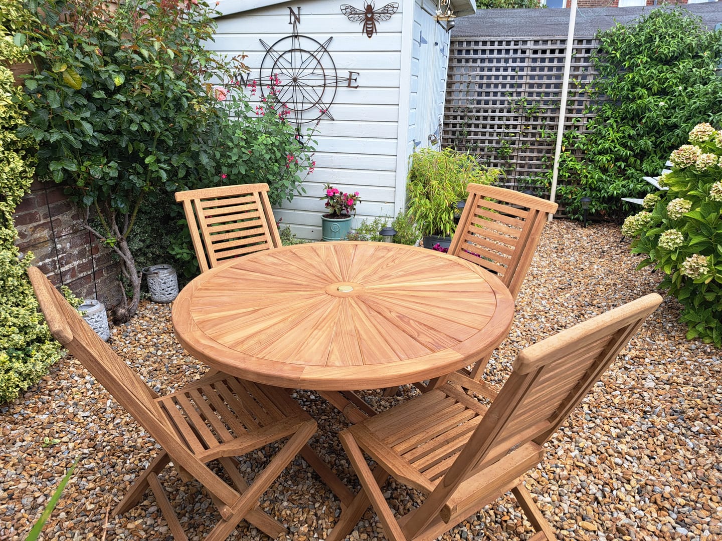 Customer photo review of Teak Sunshine 120cm Round Folding Set. Cushions included
