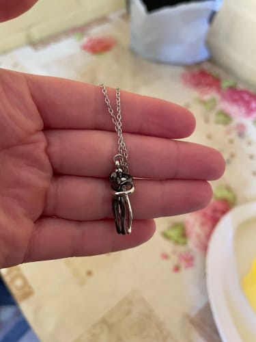 Customer photo review of Collar Abrazo Eterno