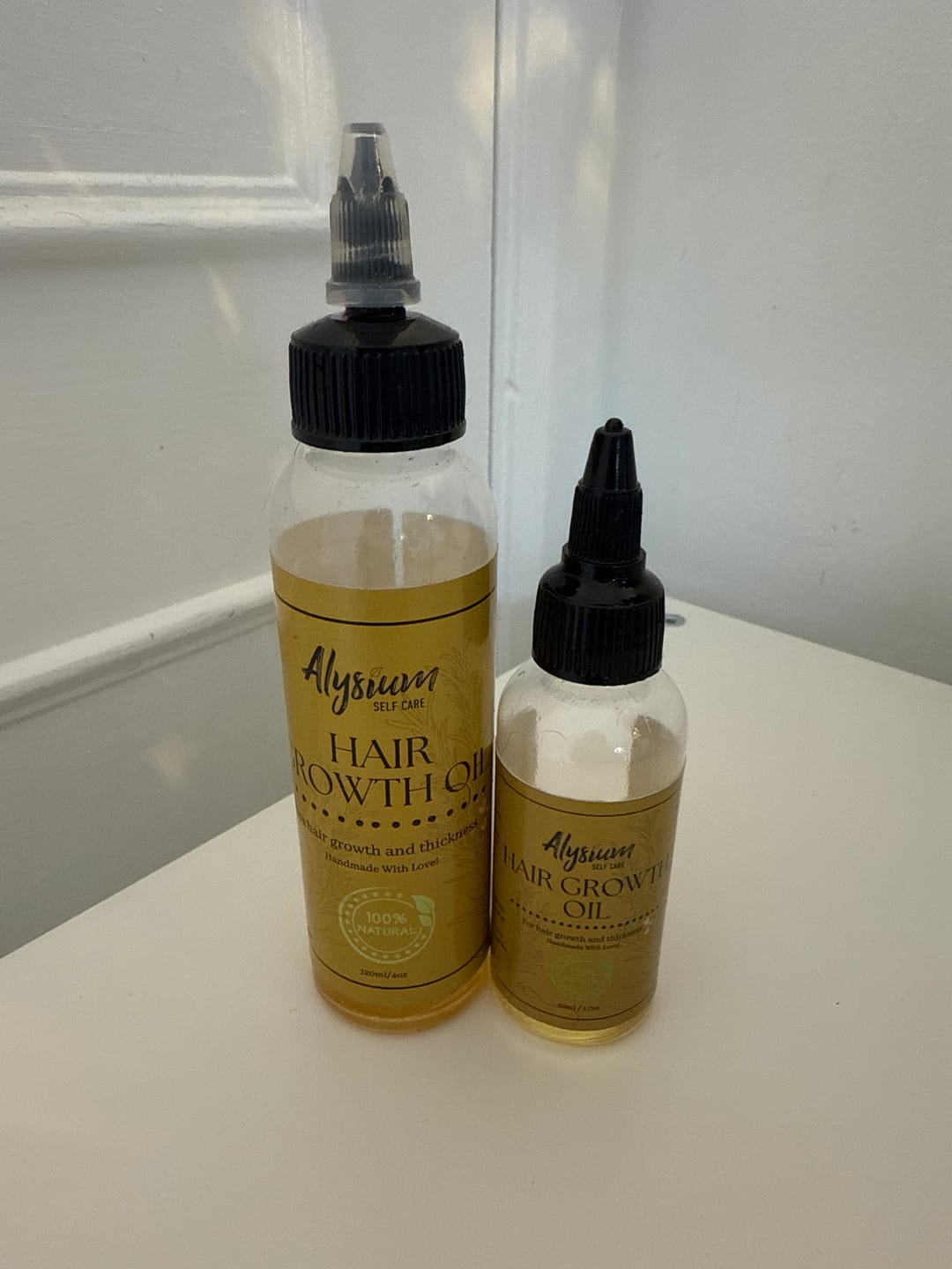 Customer photo review of 100% Natural Hair Growth / Thickening Oil