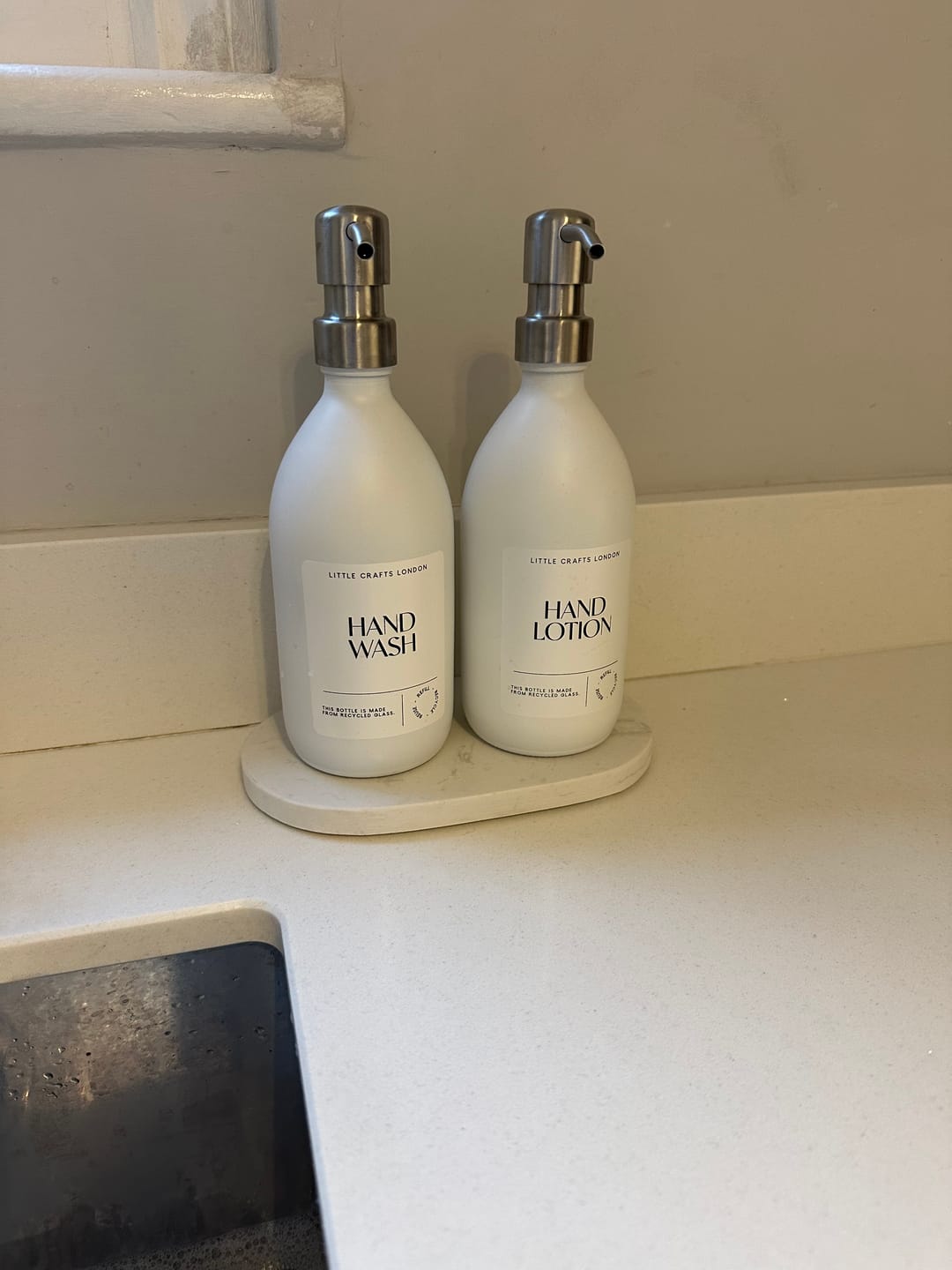 Customer photo review of Set of 2 Milky White Glass Bottle 500 ML with Metal Pump & Small Tray (White Label)