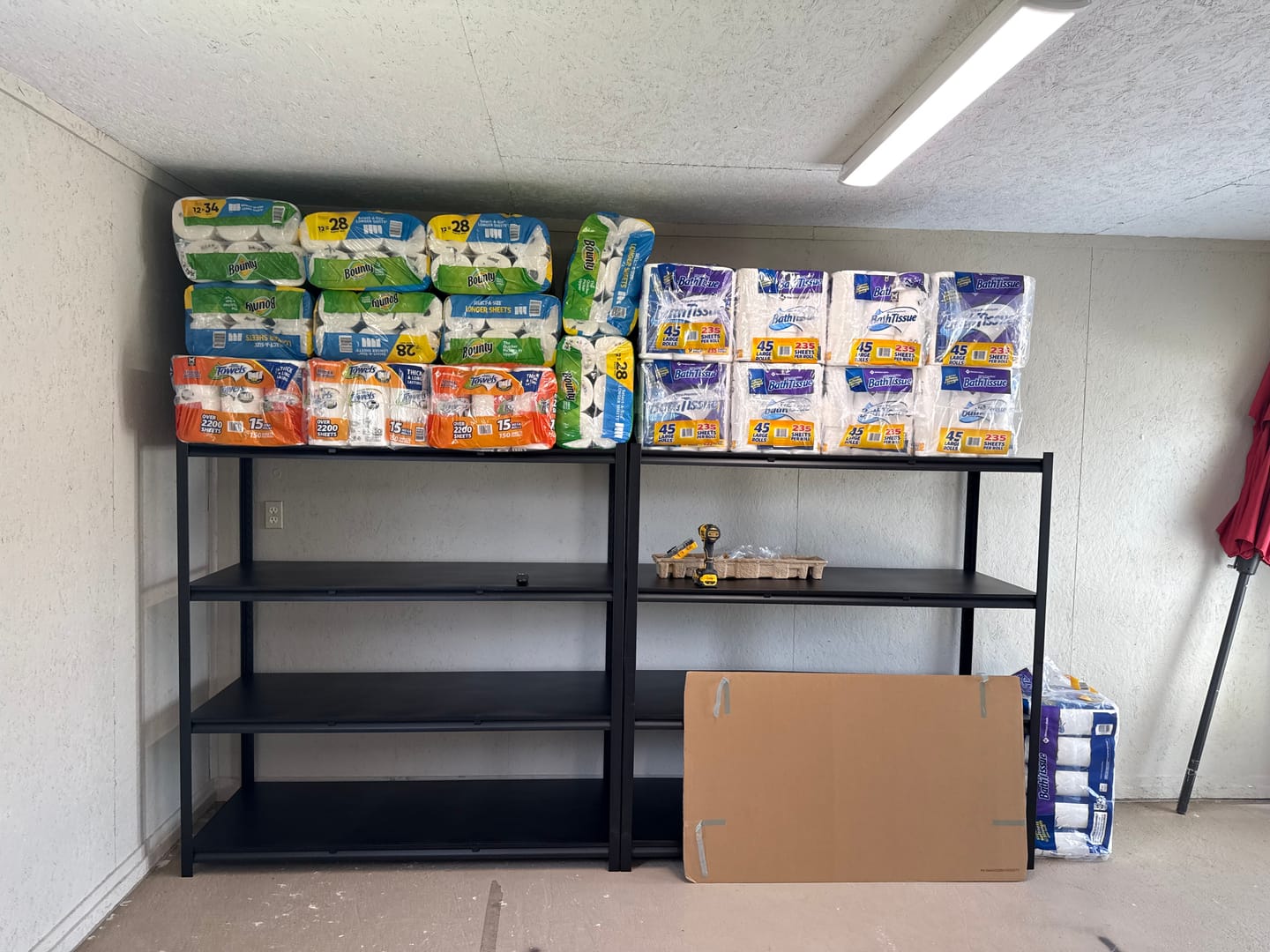 Customer photo review of Reibii 4-Tier 2650LBS Heavy Duty Industrial Garage Shelving Units,60" W Adjustable Metal Storage Shelves Racks for Garage, Warehouse, Basement