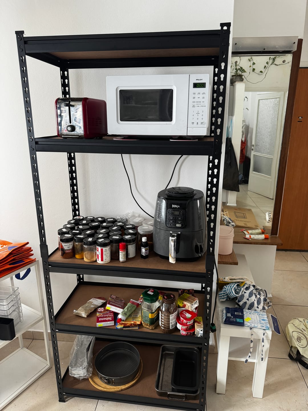 Customer photo review of כוננית מתכת פרמיום 5 מדפים מודולריים גובה 1.8 מטר