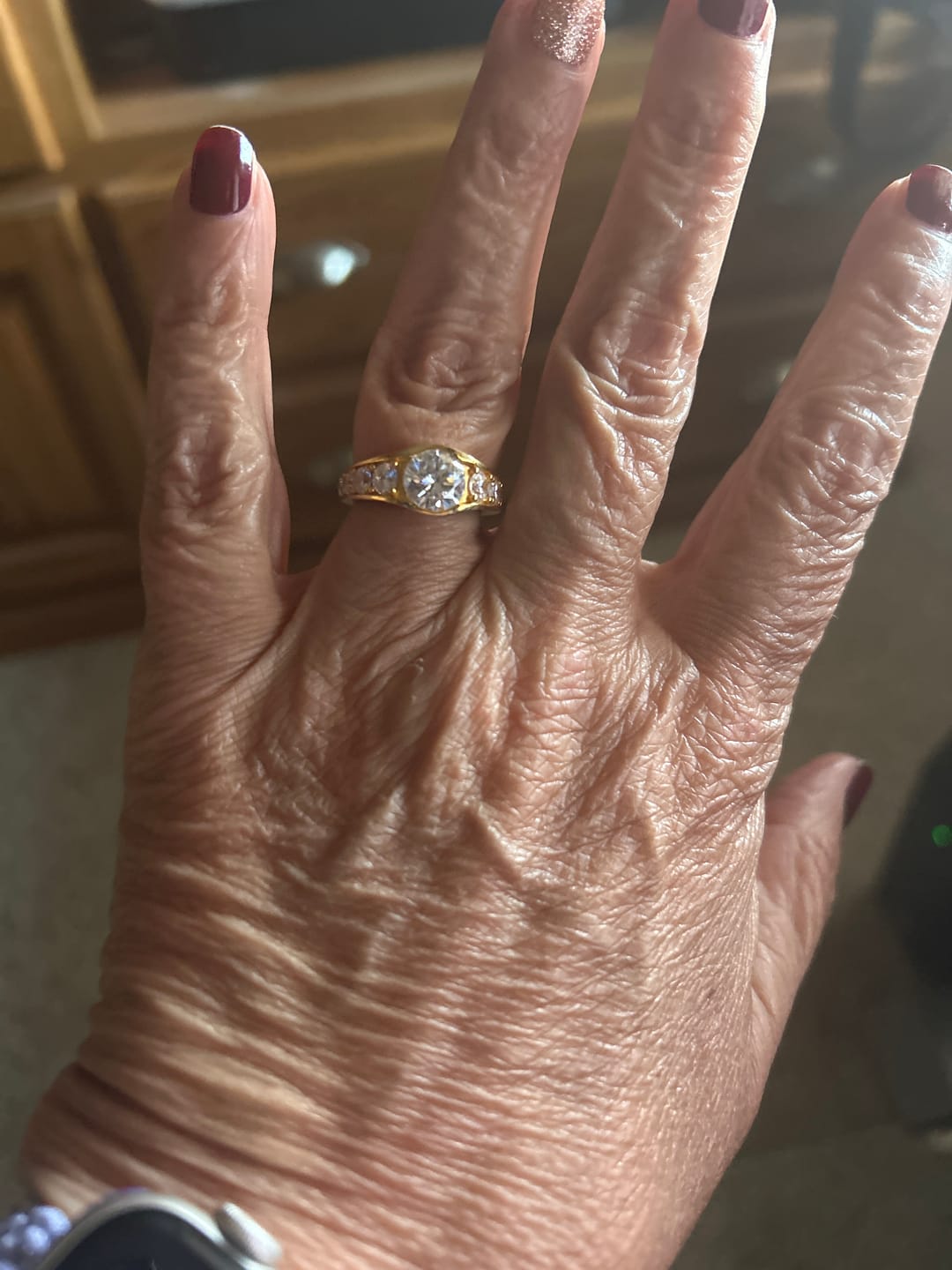 Customer photo review of Bezel Round Moissanite Channel Euro Shank Engagement Ring