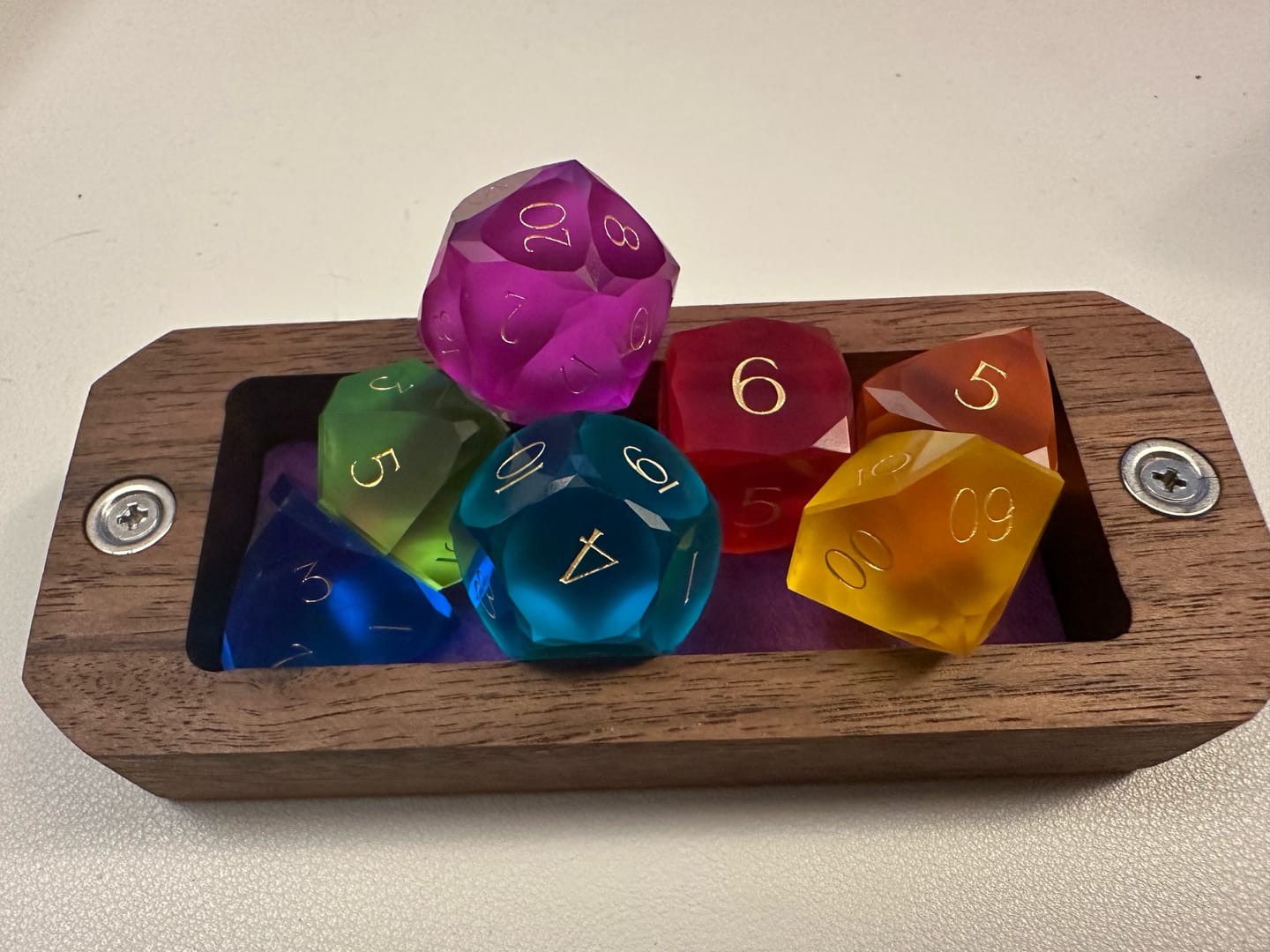 Customer photo review of URWizards D&D Resin Rainbow Candy Engraved Dice Set Multi-faceted Style