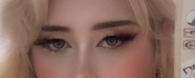 Customer photo review of Aine Swan Lake Blue Prescription Colored Contact Lenses