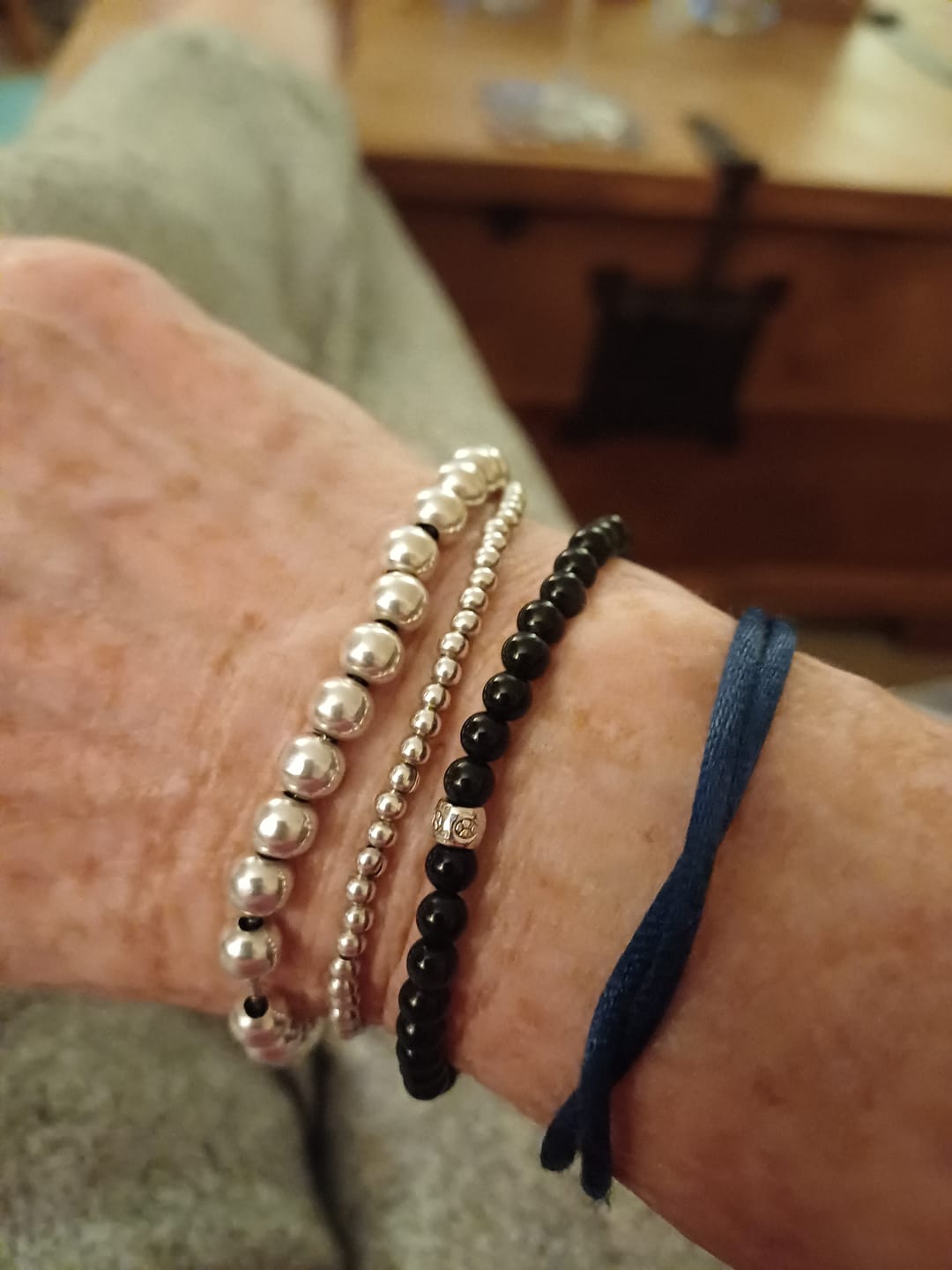 Customer photo review of Buddha Stones Natural Black Obsidian Smoky Quartz Purification Strength Bracelet