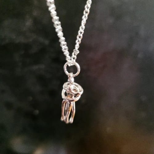 Customer photo review of Collar Abrazo Eterno