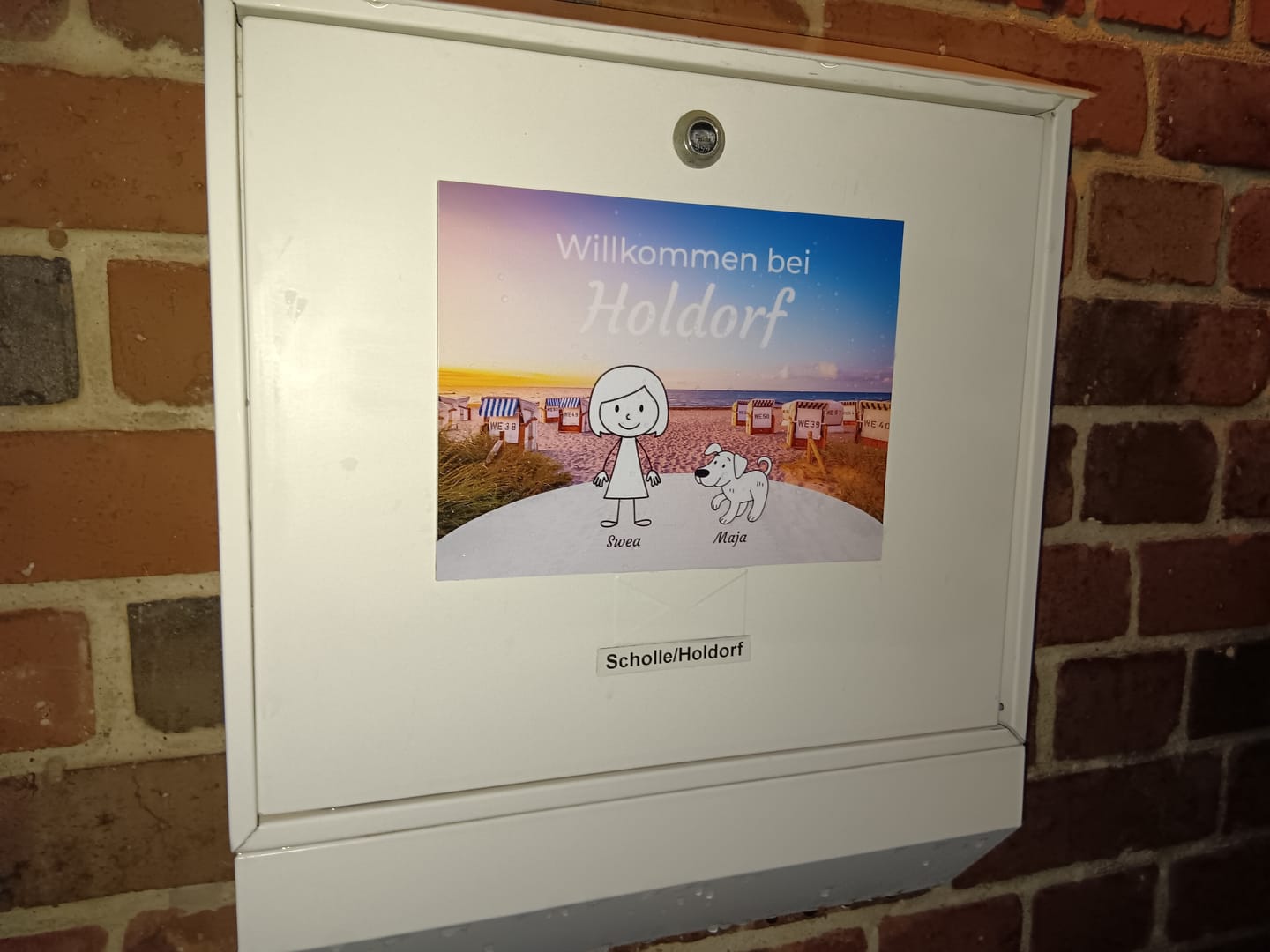 Customer photo review of Familien Türschild (UV- und wetterfest) inkl. Klebebefestigung