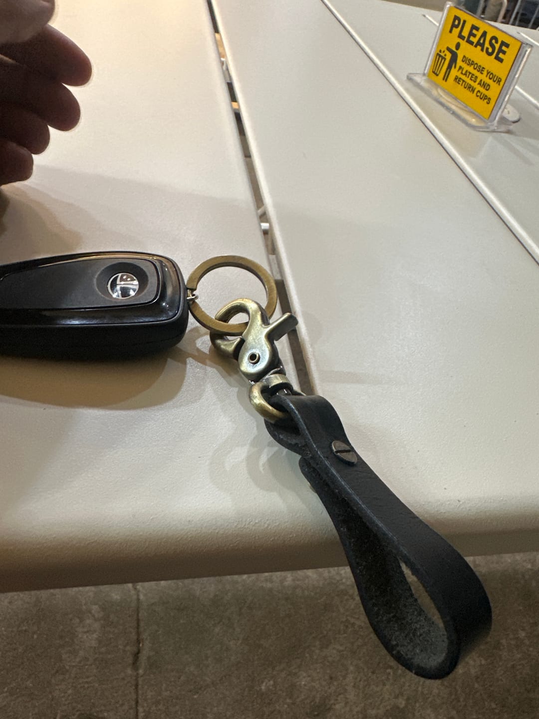 Customer photo review of key fob with antique gold