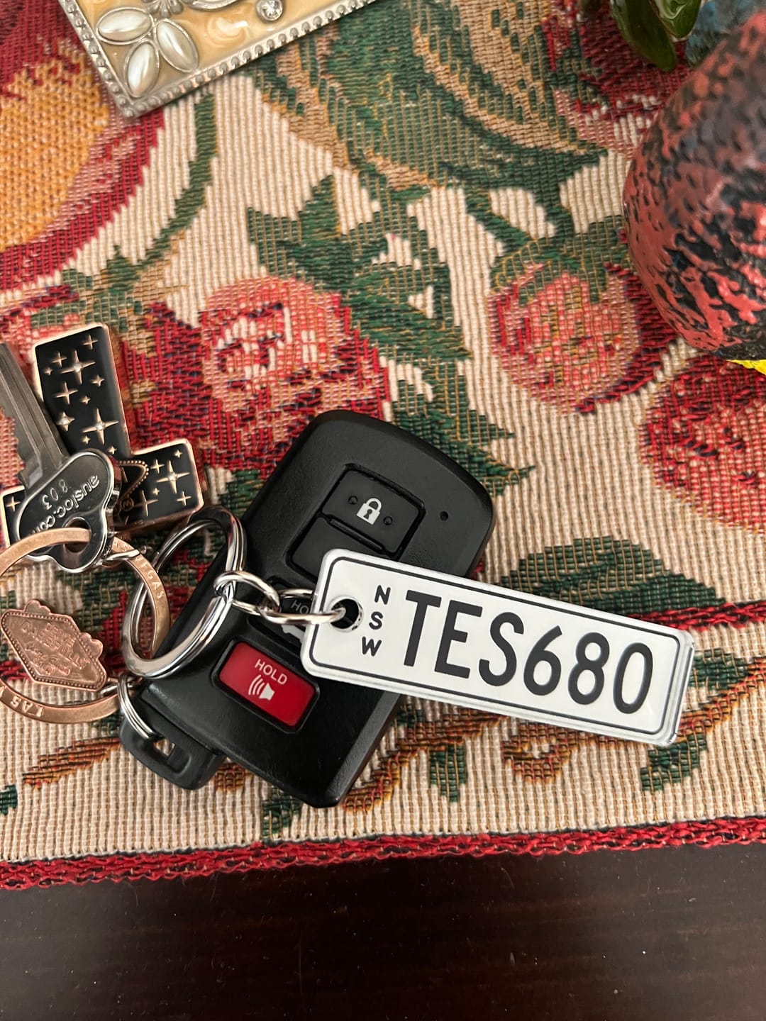 Customer photo review of NSW Colour on White Licence Plate Custom Keychain