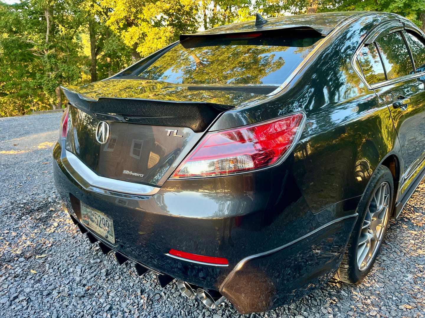 Customer photo review of 2009-2014 acura TL carbon fiber trunk spoiler.