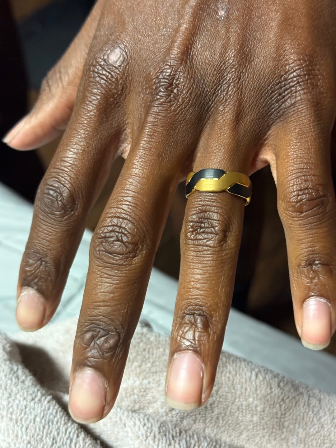 Customer photo review of Tungsten Black and Gold Infinity Knot Ring, Tungsten Rings for Men Wedding Band