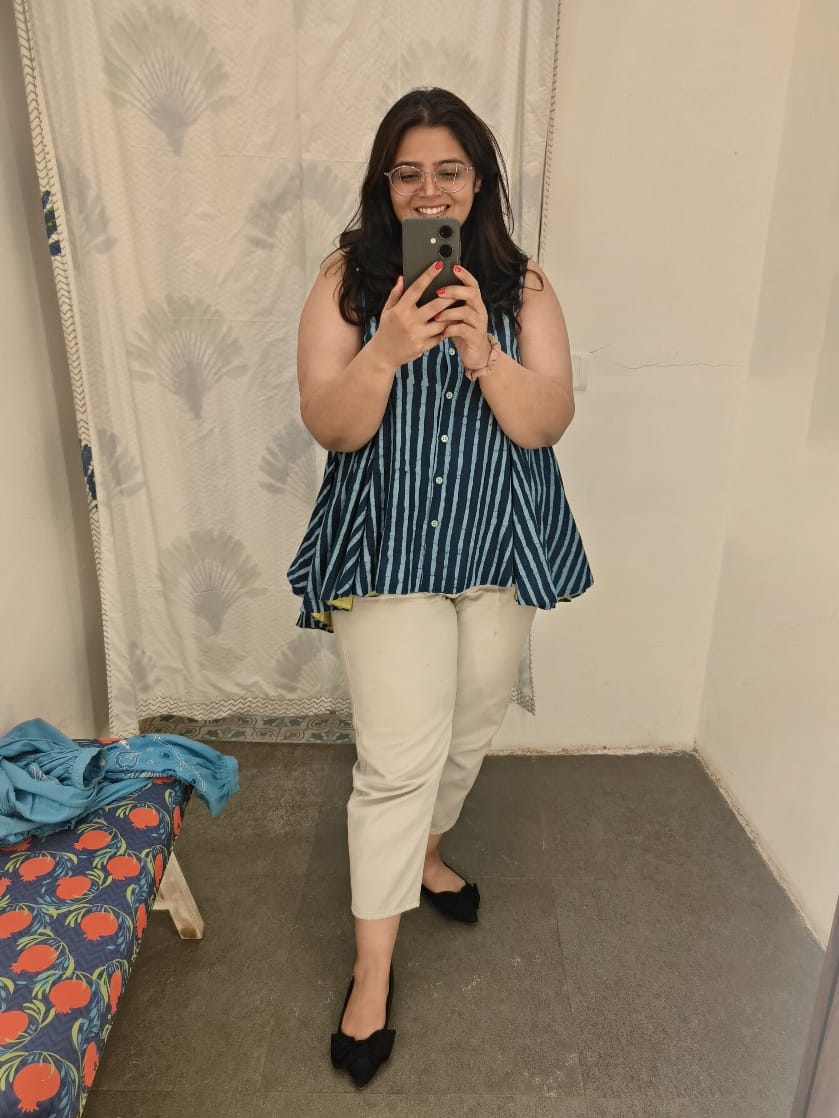 Customer photo review of Cove Sleeveless Asymmetrical Top