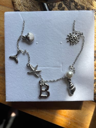 Customer photo review of SILVER OCEAN LETTER NECKLACE
