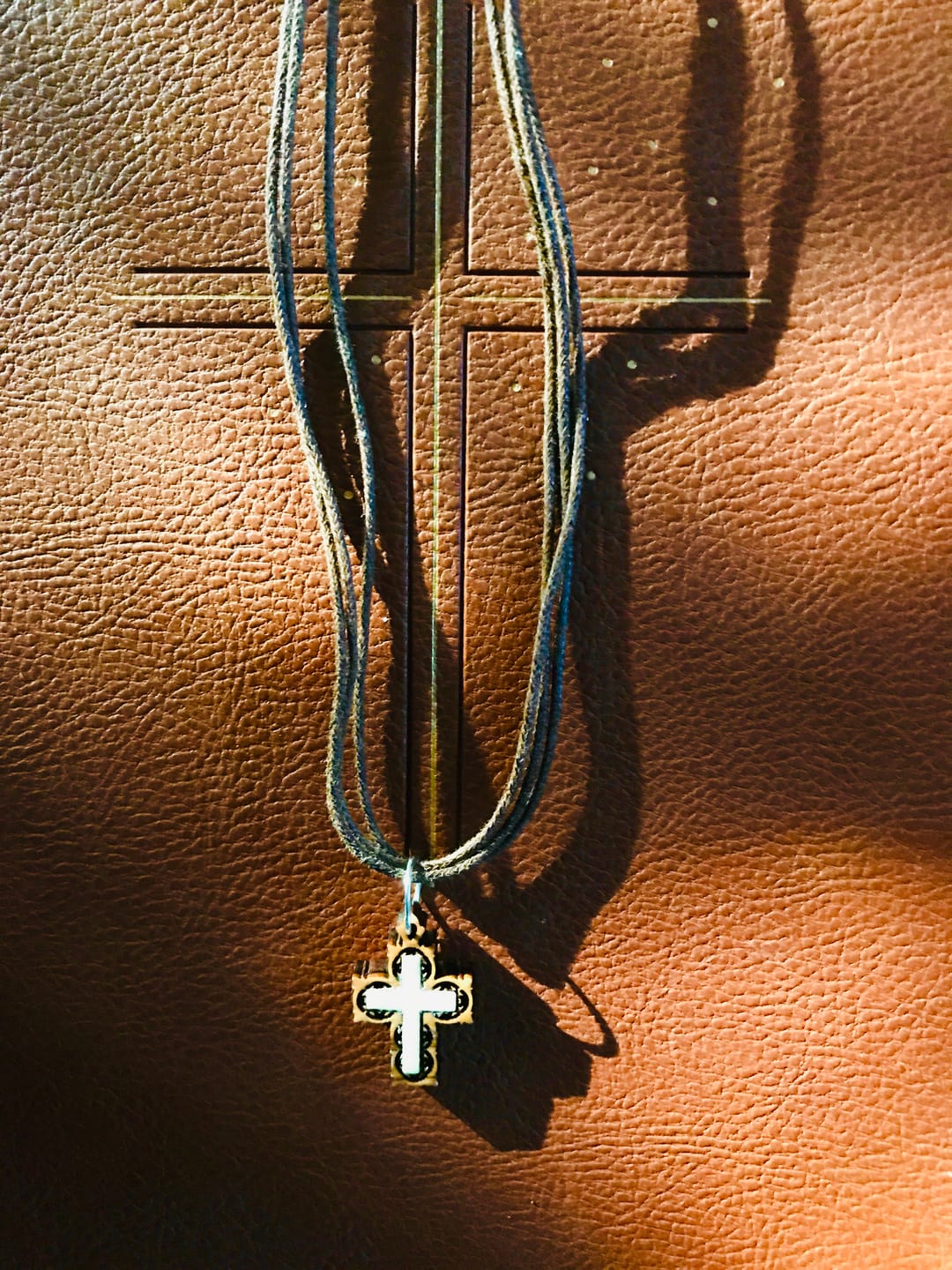 Customer photo review of Holy Land Olive Wood Carved Cross with Mother of Pearl
