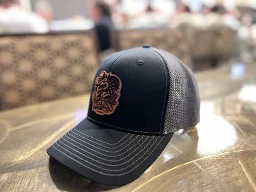 Customer photo review of Custom Leather Patch Trucker Hat - Richardson 112+