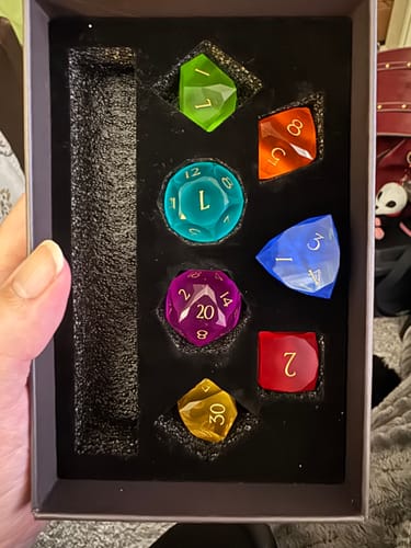 Customer photo review of URWizards D&D Resin Rainbow Candy Engraved Dice Set Multi-faceted Style