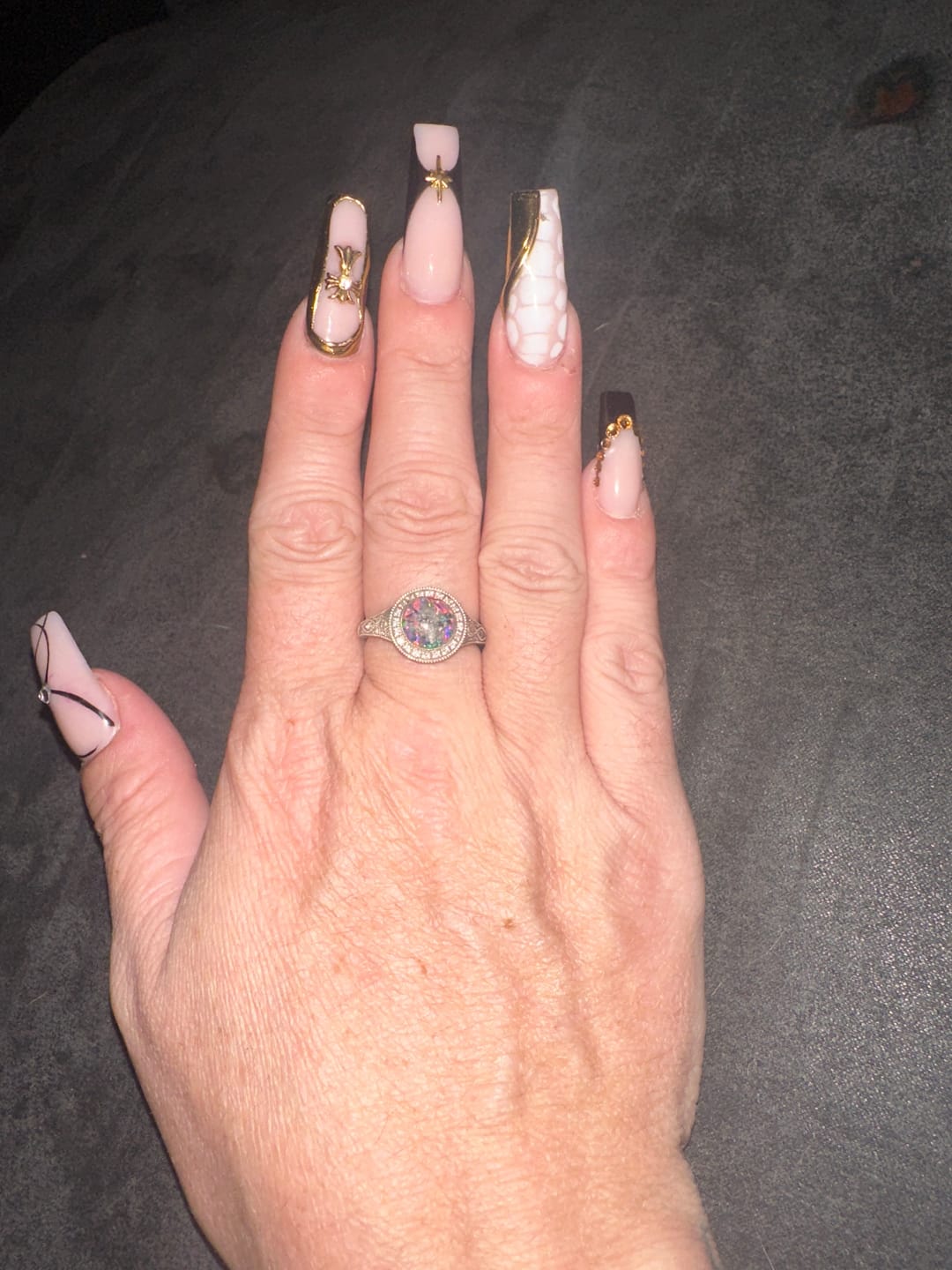 Customer photo review of Bedazzled Filigree Circle Opal Cremation Ring