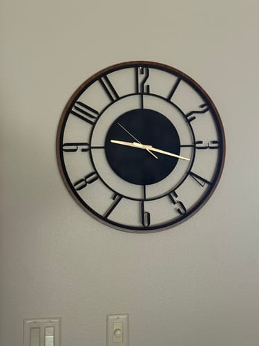 Customer photo review of METAL WALL CLOCK with Wooden Corners