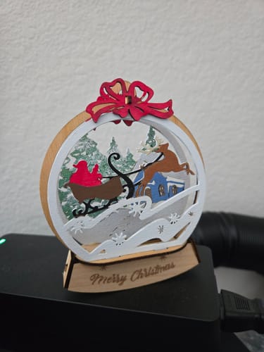 Customer photo review of 3D Christmas Snow Globe ball ornaments bundle laser cut svg file