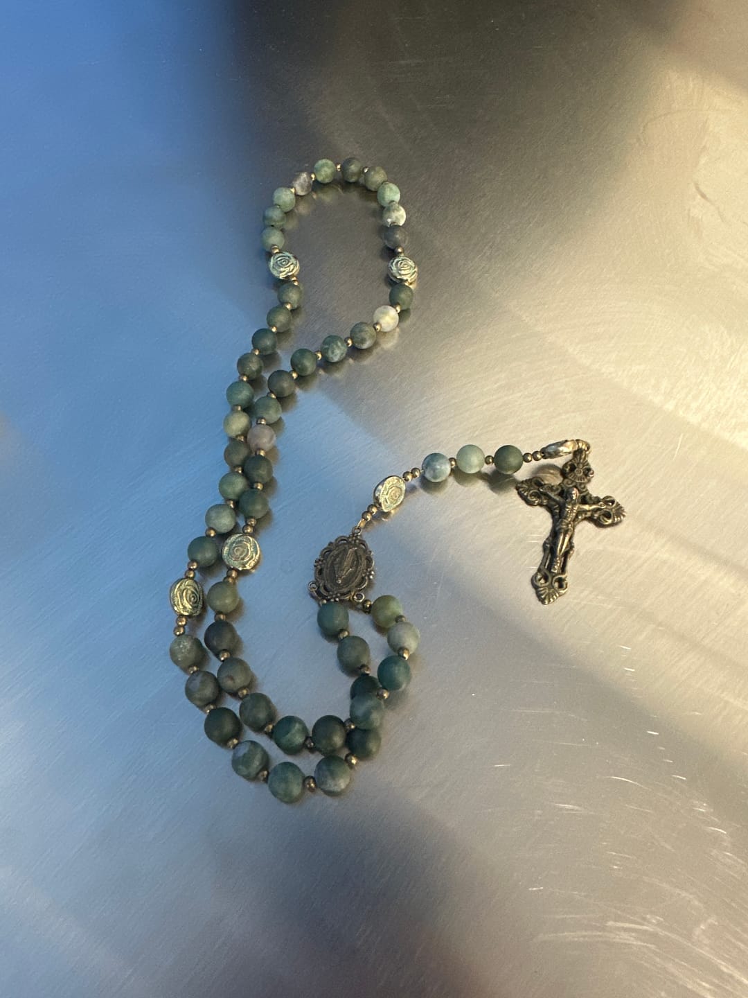 Customer photo review of Christianartworkshop Green Agate Prayer Rosary with Bronze Rose Accents: A Sacred Journey of Healing and Faith