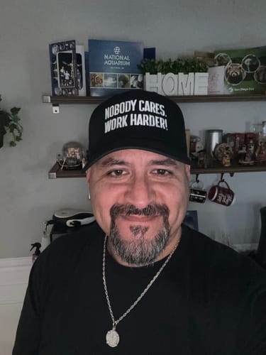 Customer photo review of NOBODY CARES WORK HARDER TRUCKER HAT