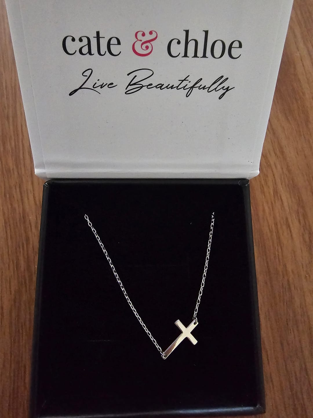 Customer photo review of Nancy 18k White Gold Plated Cross Pendant Necklace
