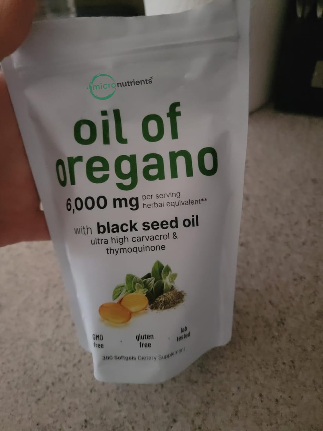 Customer photo review of Aceite de orégano con aceite de semilla negra