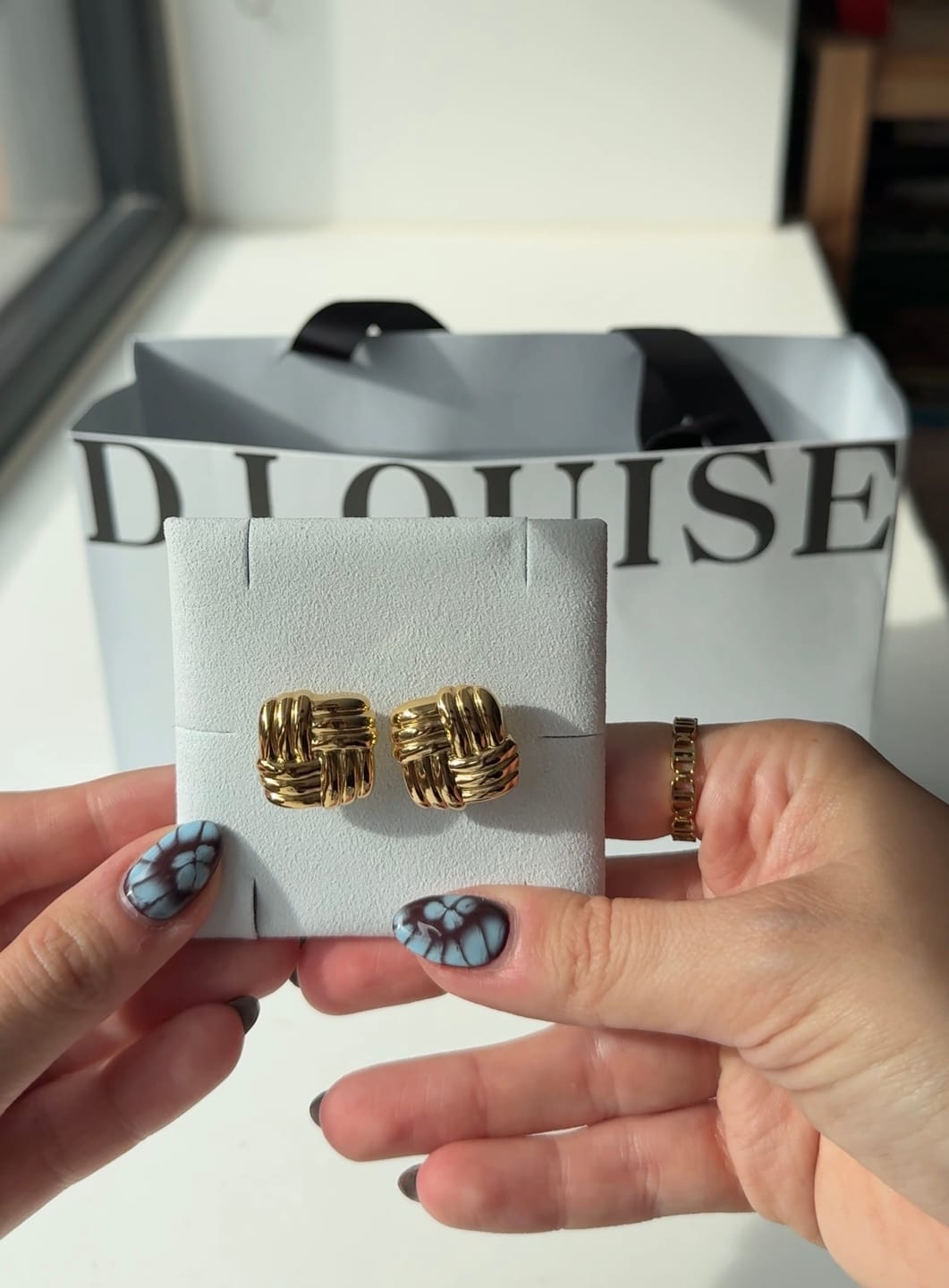 Customer photo review of Statement Twist Studs