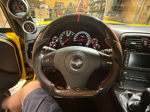Customer photo review of Genuine Carbon Fiber Steering Wheel With Button Trim For C6 Corvette 2006-2011