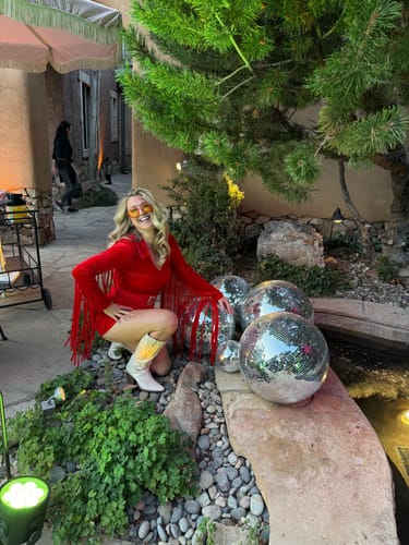 Customer photo review of Cherry Bomb Fringe Romper