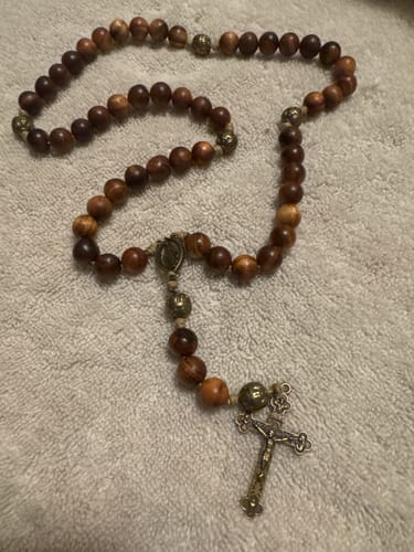 Customer photo review of Christianartworkshop 10mm Agarwood & Metal Cloud Bead Handmade Rosary - A Sacred Blend of Tradition and Faith