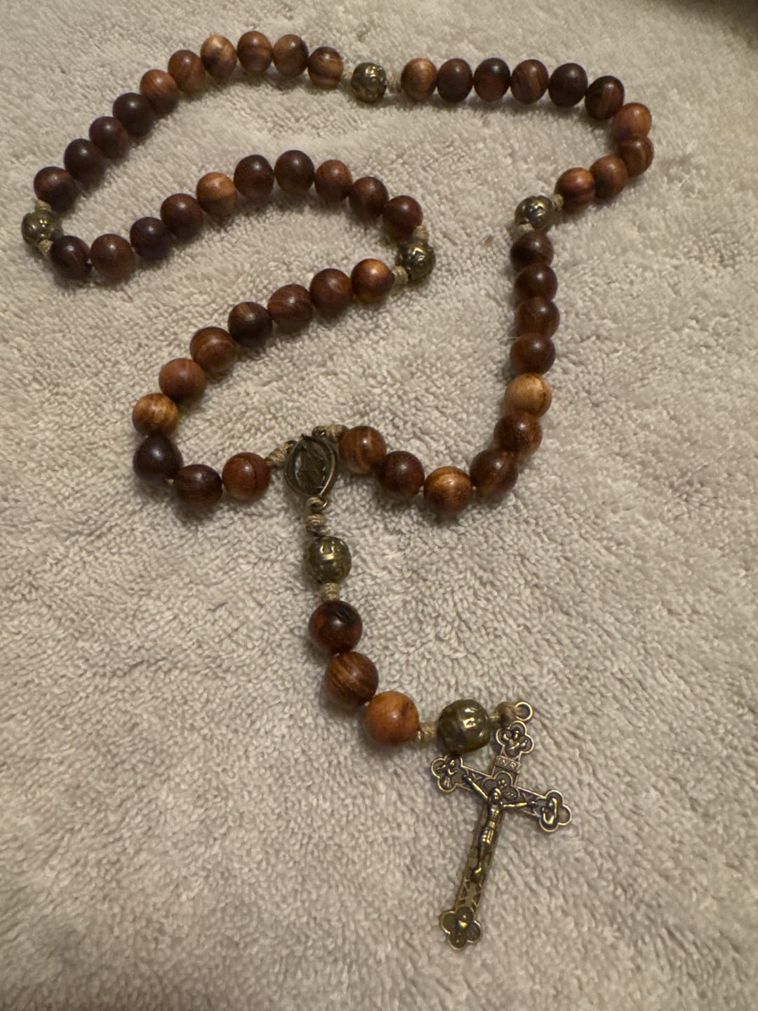 Customer photo review of Christianartworkshop 10mm Agarwood & Metal Cloud Bead Handmade Rosary - A Sacred Blend of Tradition and Faith