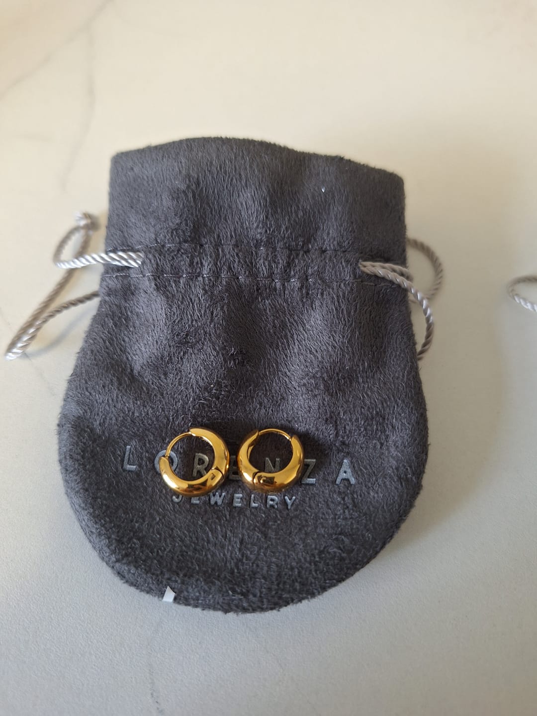 Customer photo review of Par Mini Arracada Gruesa