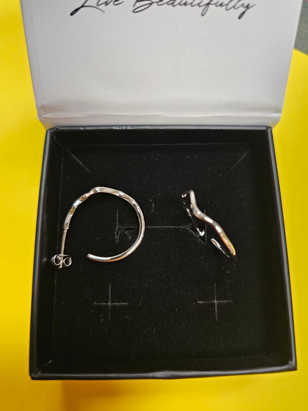 Customer photo review of Serena 18k White Gold Plated 22mm Wavy Hoop Earrings