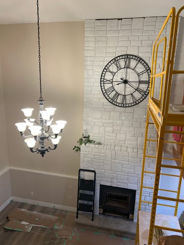 Customer photo review of 48" Black Roman Numeral Wall Clock