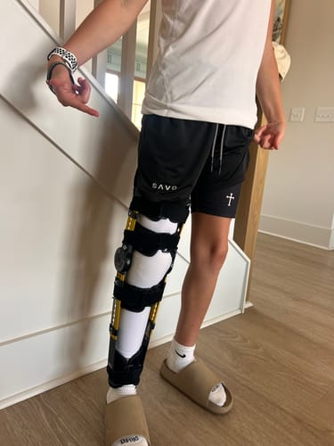 Customer photo review of SAVD 'Minimal Cross' Youth Performance Shorts