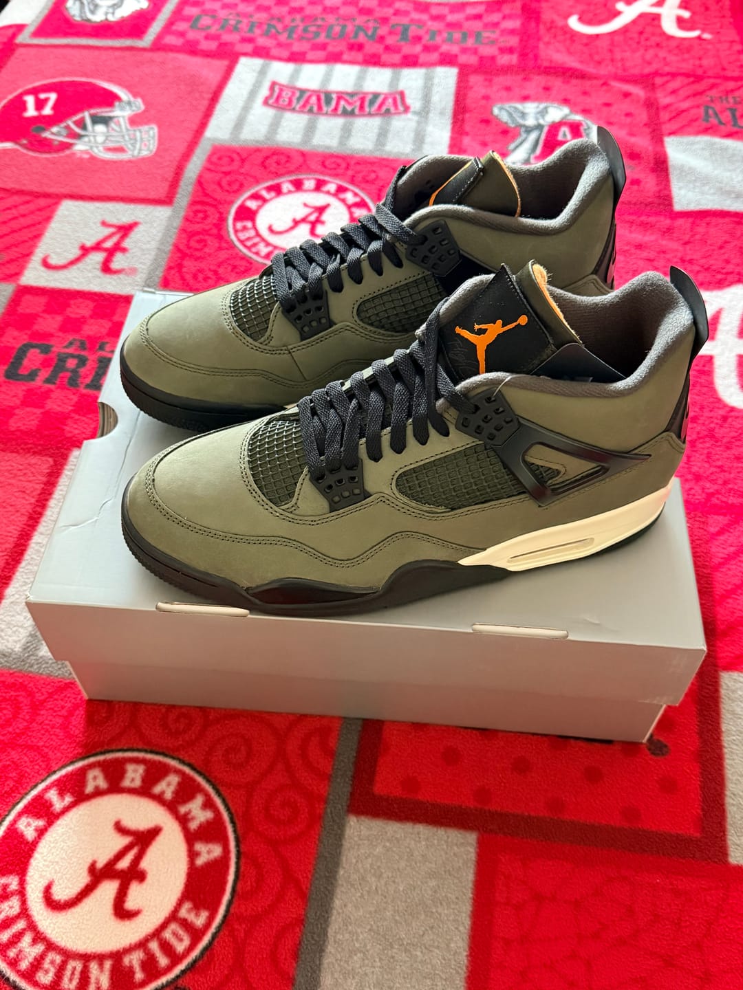 Customer photo review of Undefeated X Jordan 4 Retro 2025