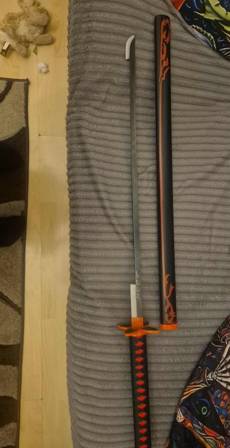 Customer photo review of Demon Slayer - Shinobu Kocho Lavender Blue Nichirin Display (Straight Blade) Katana