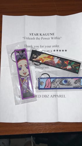 Customer photo review of Demon Slayer Embroidered Keychains